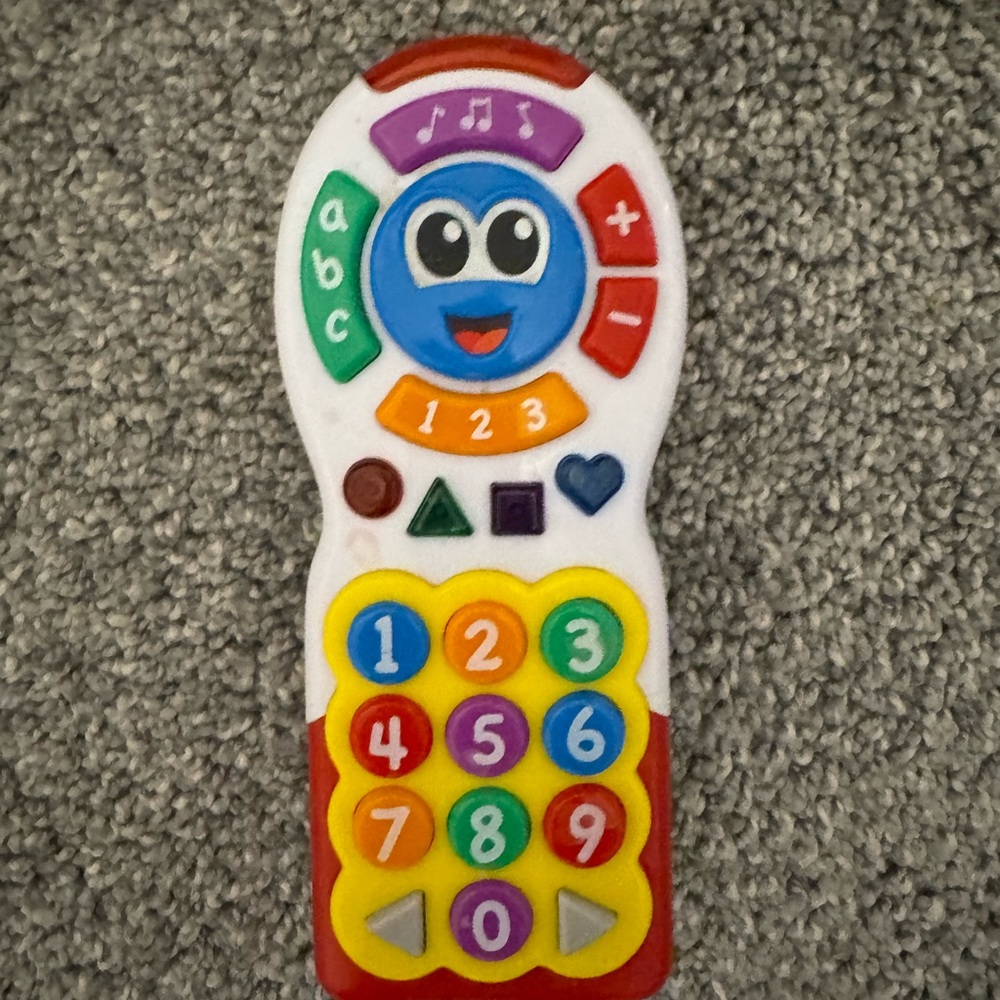 Red and Blue Learning Toy with Geometric Shapes